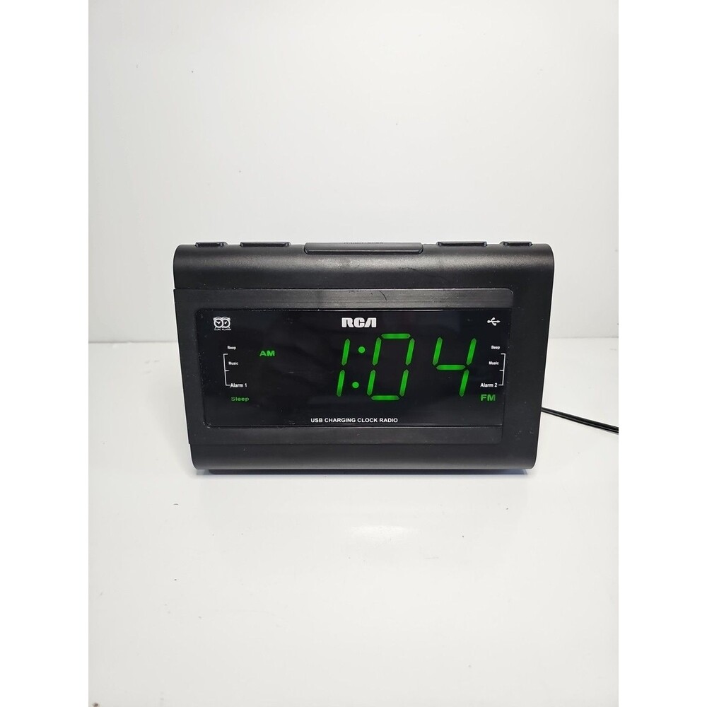 RCA RC142-D AM/FM Radio Alarm Clock with USB. Dial Alarms, Audio In your phone